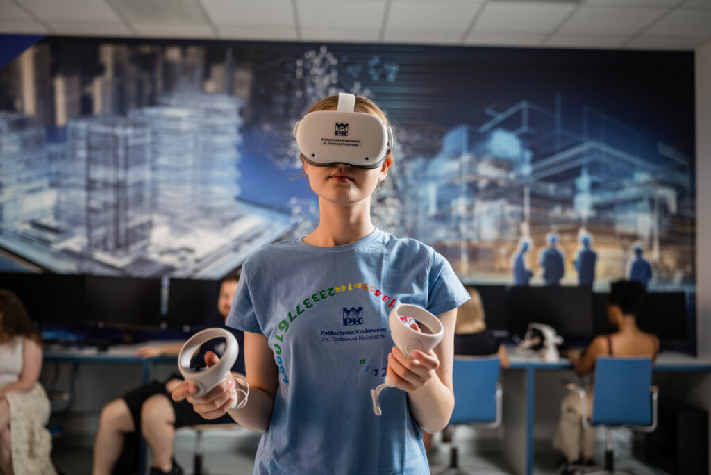 technologia_vr Dziewczyna w błękitnym podkoszulku i okularach VR
